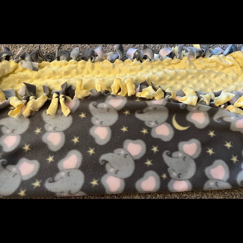 Hand made no sew baby blanket.